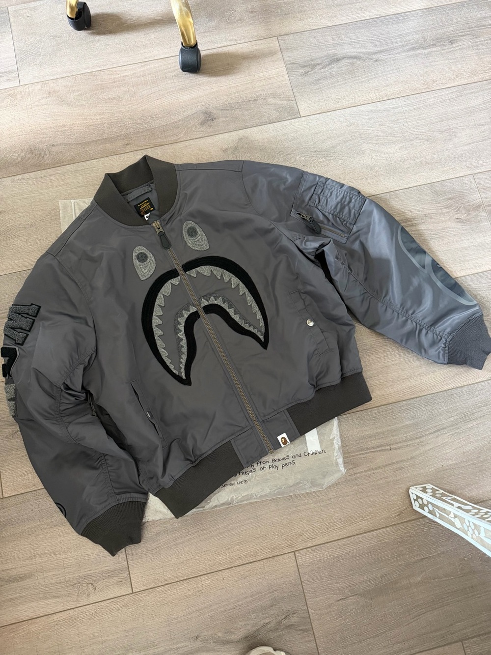 A Bathing Ape BAPE Gray Bomber Jacket with Shark Graphic